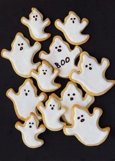 decorated cookies with ghost and ghost faces on them