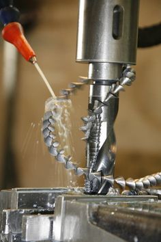 Photo about a metal drill press with shavings of metal. Image of silver, shiny, cool - 7070644 Drill Press, A Metal, Shaving, Photo Image, Stock Photos, Silver