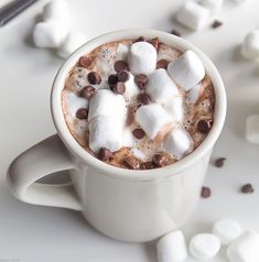 hot chocolate with marshmallows in a white mug