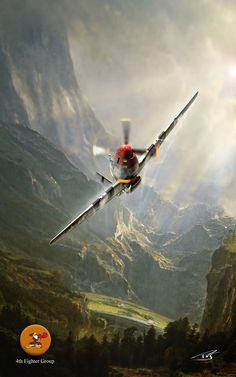 a small airplane flying over a mountain range