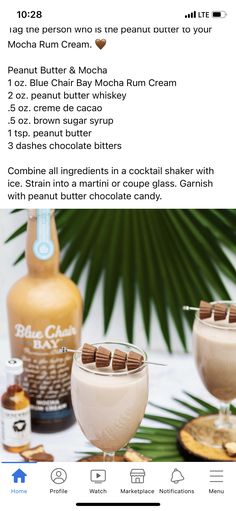 two glasses filled with ice cream next to a bottle of booze and some chocolate