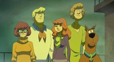 scooby and friends standing next to each other