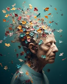 a man with butterflies on his head in front of the image is blue and green