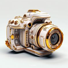 a white and gold camera on a gray background