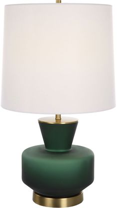 a green table lamp with a white shade on the base and a gold plated metal base