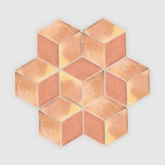 an image of a hexagonal pattern made out of wood blocks on a gray background