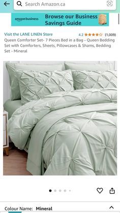 an image of a bed with white sheets and green comforters on the bottom row