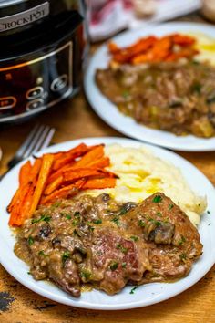 two white plates topped with meat and veggies next to an instant pressure cooker