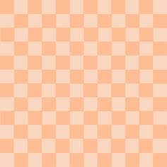 an orange and white checkered background with small squares on the bottom right hand corner