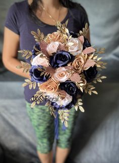 a woman holding a bouquet of flowers in her hands and wearing leggings with tights