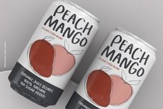 two cans of peach mango tea sitting side by side