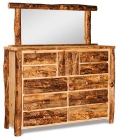 a wooden dresser with mirror on the top and bottom drawer, made out of logs