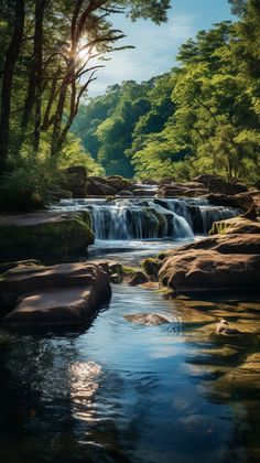 the sun shines brightly through the trees over a small waterfall that flows into a river surrounded by rocks