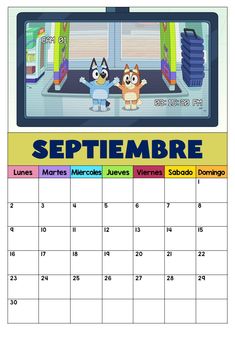 a calendar with an image of two cats on the screen and one cat standing in front of it