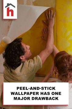 a man and woman are working on a piece of art with the words peel - and - stick wallpaper has one major drawback