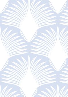 a blue and white wallpaper with large leaves