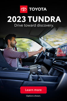 a man driving a car with the text tundra made to explore learn more options shown