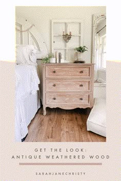 an antique dresser in the corner of a bedroom with white walls and wood flooring