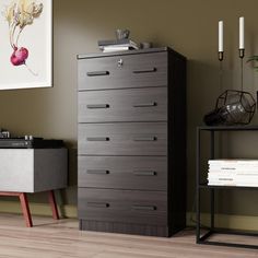 a dresser and side table in a room