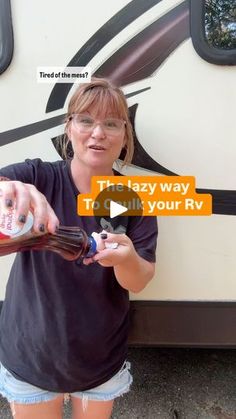 a woman is pouring something into a bottle in front of a motor home with the words lazy way to chill your rv