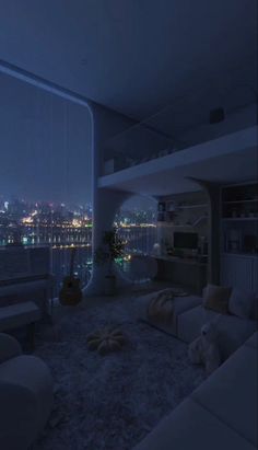 a living room filled with furniture and a large window overlooking the city at night time