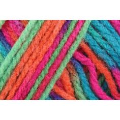 multicolored skeins of yarn with different colors and sizes on the top