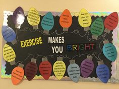 a bulletin board with christmas lights and words on it that says exercise makes you bright