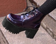 Add 3.5” of style to your step today! These durable and fashion forward platform boots provide an added lift to your style and are surprisingly easy to walk in! The purple rub-off leather is vegan friendly and made with eye-catching oversized silver eyelets. These boots are true vegan shoes for the environmentally conscious shoe shopper! Creeper Boots, Pointed Boots, Low Boots, Buckle Boots, Environmentally Conscious, Vegan Shoes, Shoes Outlet, Shoe Store, Platform Boots