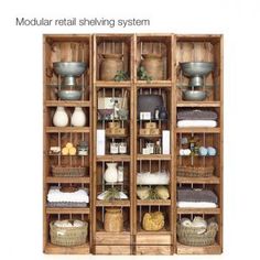 an image of a wooden shelf with many items on it and the words modular retail shelving system