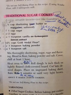 the recipe for traditional sugar cookies is written on a piece of paper with pink writing