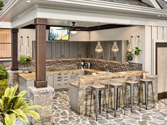 an outdoor kitchen with stone counter tops and bar stools