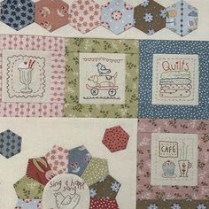 a patchwork quilt with different designs on it