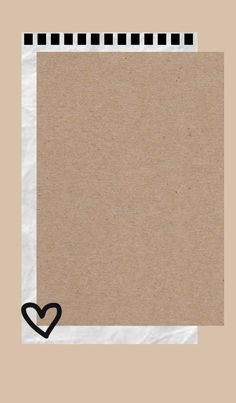 a piece of brown paper with a black heart in the middle and a checkered border around it