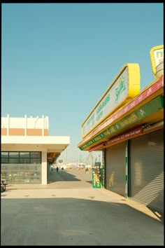 an empty parking lot in front of a building