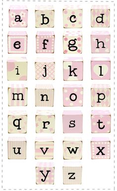 the letters are made up of blocks with pink and white designs on them, as well as polka dots