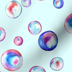 an image of watercolor bubbles on a white background with red, blue and pink colors