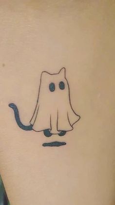 a small tattoo with a cat on it