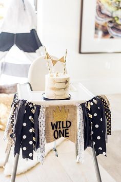 a table topped with a cake covered in a crown