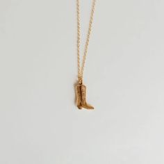 Calling all cowgirls! The Dolly Boot Necklace is the perfect accessory for all our rodeo sweethearts! Cute little boot charm attached to a dainty, high-quality gold covered chain. Stainless steel charm. Available in a 19" chain, for however you choose to layer. Lash Next Door, Mauve Jewelry, Boot Charm, Book Necklace, Cowgirl Boot, Colors For Skin Tone, Pearl Collection, Beauty Lover, Cowgirl Boots