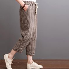 2016 Khaki striped linen pants summer crop pantsThis dress is made of cotton linen fabric, soft and breathy, suitable for summer, so loose dresses to make you comfortable all the time.Measurement: Size M length 77cm / 30.03"Hip104cm / 40.56" Waist 64cm / 24.96" Leg Cir 36cm / 14.04" Size L length 78cm / 30.42"Hip108cm / 42.12" Waist 66cm / 25.74" Leg Cir 38cm / 14.82"Materials used:linenPayment: We accept payment by paypal and credit card. if you would like to pay by credit card, please choose p Relaxed Spring Harem Pants, Ankle-length, Relaxed Ankle-length Harem Pants For Spring, Relaxed Spring Ankle-length Harem Pants, Spring Relaxed Ankle-length Harem Pants, Striped Linen Pants With Elastic Waistband, Striped Linen Beach Pants, Striped Linen Pants For Loungewear, Striped Relaxed Fit Linen Bottoms, Striped Linen Bottoms Relaxed Fit