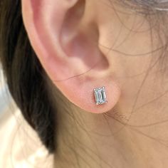 These elegant everyday stud earrings handcrafted in 14K white gold, feature colorless emerald cut fine moissanite. Made to Order Ship within 3-4 weeks. - Stone info: Fine moissanite, D/VVS quality, 6x4mm emerald cut - Ct weight: 1.2ctw - Sold as A Pair. - The earrings come with 14K solid gold backings. - Made in 14 karat gold. - Stamp with 14K. Luxury White Emerald Cut Diamond Earrings, Luxury Platinum Emerald Cut Earrings, Emerald Cut Earrings Studs, Classic Emerald Diamond Earrings Gia Certified, Classic Gia Certified Emerald Diamond Earrings, Emerald Cut Diamond Earrings In White Gold, Fine Jewelry Emerald-cut Lab Grown Diamond Earrings, Classic White Gold Emerald Diamond Earrings, Diamond White Emerald Cut Diamond Earrings With Prong Setting