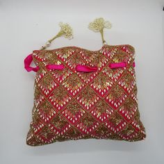 rani pink fabric pearl beaded the shining handbag drawstring purse potli bag for woman | indian wedding purse and potli gifting giveaways Designed with the heart, this beautiful Potli or batawa bag are eye catchy and made of premium material. Key Features: Embroidery art work This potli is good match with both Indian and western outfits and are superb for wedding and festive parties This would be best complement to your designer saree, lenhga or any other kind of dress This is the combination of Drawstring Purse, Wedding Purse, Potli Bags, The Shining, Pink Fabric, Western Outfits, Pearl Beads, Embroidery Art, Saree Designs