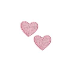 two pink heart shaped patches on a white background with the word love written in it