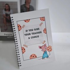 an open notebook with the words if you give your teacher a cookie