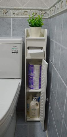 a small bathroom with a washer and dryer