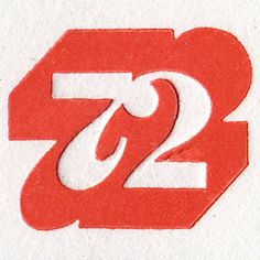 the number 722 logo is shown in red and white on a piece of paper