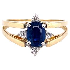 Vivid blue sapphire or a sparkling white cluster of diamonds, it's your choice. This fabulous flip ring presents both looks on demand. Offering a .75 carat (6.5 x 4mm) oval faceted sapphire accented with four round diamonds and on the reverse flip, a cluster of ten round H/VS diamonds, .46 carat total weight. Making this possible is a unique fourteen karat yellow gold 14K double ring shank that is hinged at the ring's head and easily flips to change to your desired style. In ring size 8.5. Resiz Flip Ring, Reversible Ring, Diamond Crown, Ring Shank, Blue Sapphire Diamond, Vs Diamond, Detailed Ring, Double Ring, Diamond Cluster Ring