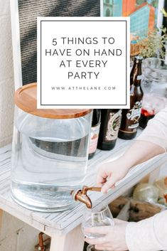 a woman is pouring water into a glass with the words 5 things to have on hand at every party