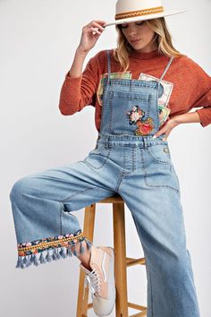 Adjustable straps, back and side pockets. Loose fit and slouchy. Wide leg bottoms and tassel . Front kangaroo pocket. Embroidery Overalls, Blouse Tank Top, Bathing Suit Covers, Maxi Dress Party, Jean Leggings, Outerwear Sweater, Skirted Swimwear, Skirt Pants, Sweater Jacket