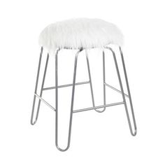 a white stool with metal legs and a furry seat pad